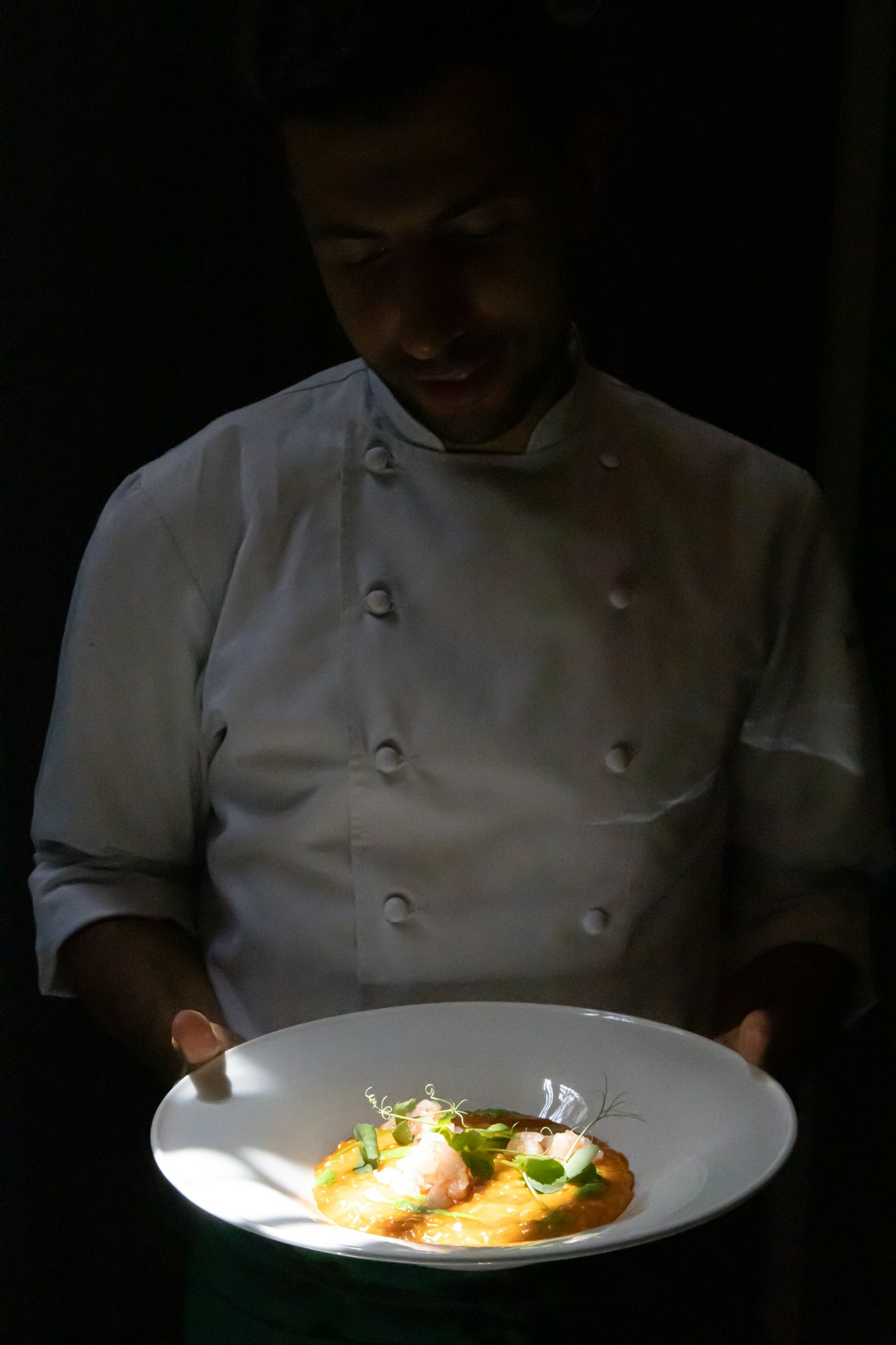 A cook plating at the pass